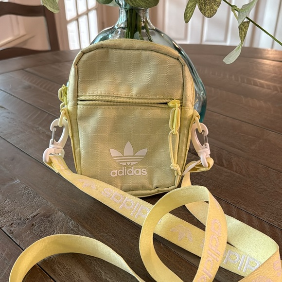 NWOT, Adidas crossbody phone/ utility pouch in neon yellow . - Picture 2 of 5